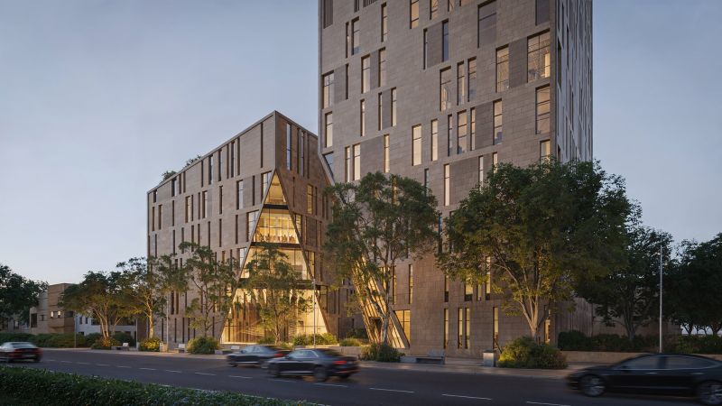 Render of the Qarar Al Majdiah podium with its triangular glazed atrium at street level